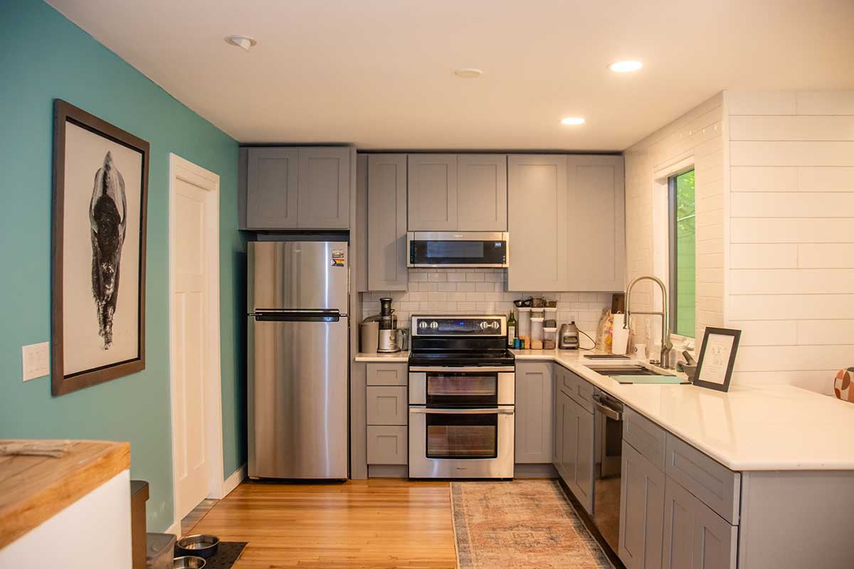 photo of kitchen with gray cabinets