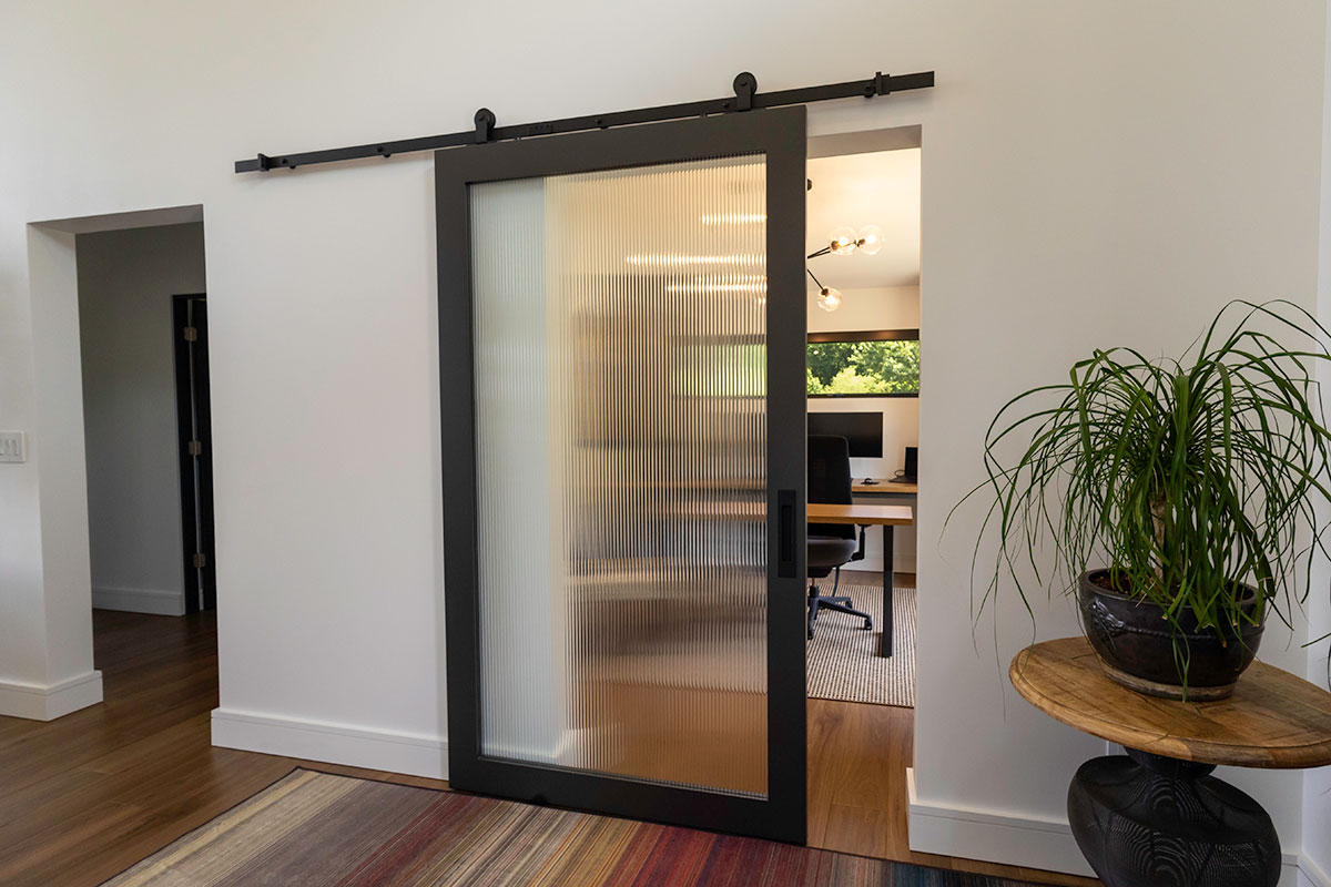 photo of sliding door opening into a home office